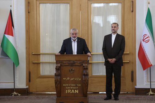 Palestinian group Hamas' top leader, Ismail Haniyeh and Iran's Foreign Minister Hossein Amir Abdollahian attend a press conference in Tehran