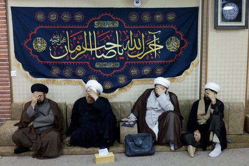 Religious clerics offer condolences over the deaths of Iran's President Ebrahim Raisi and others, at the representative office of Iran's Supreme Leader Ayatollah Ali Khamenei, in Najaf
