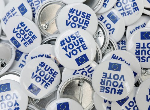 FILE PHOTO: Pin badges encouraging people to vote in June's European Parliament elections are seen, in Malta