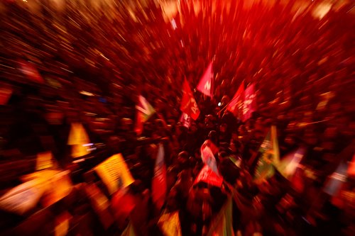 People gather on the Place de Republique following the results of the European elections, in Paris
