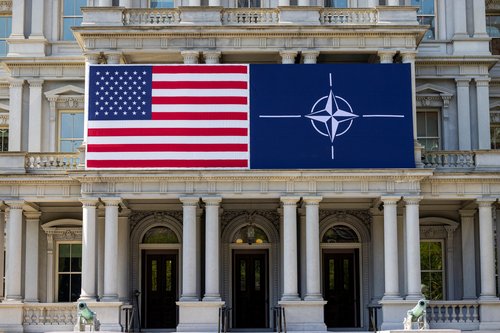 The U.S. flag alongside the NATO flag in Washington