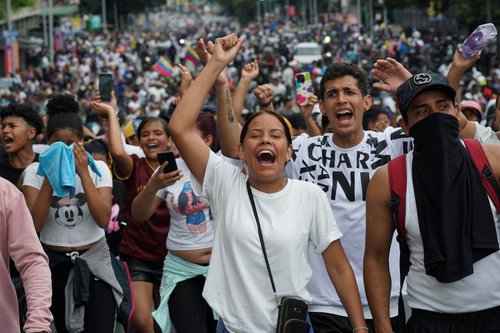 Supporters of Venezuelan opposition demonstrate following the announcement Venezuela's President Maduro won the presidential election, in Caracas