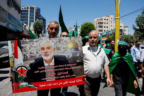 Palestinians protest after the assassination of Hamas leader Ismail Haniyeh in Iran, in Hebron