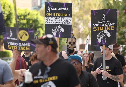 Activists and members take part in the SAG-AFTRA Video Game Strike kick-off picket outside Warner Bros. Games in Burbank