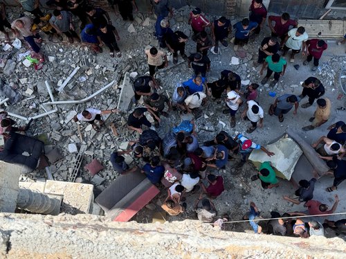 Aftermath of an Israeli strike on an apartment in Gaza City