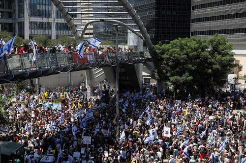 Protesters rally against the government and to show support for the hostages who were kidnapped during the deadly October 7 attack, in Tel Aviv