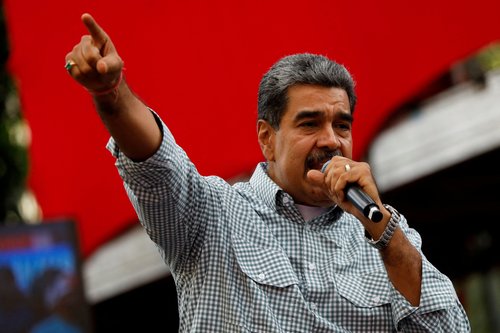 FILE PHOTO: Venezuelan President Nicolas Maduro delivers a speech