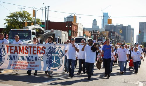 Teamsters union members march in the annual Labor Day Parade in Detroit
