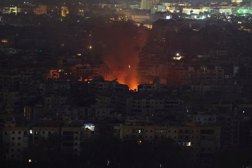 Smoke billows over Beirut's southern suburbs, amid ongoing hostilities between Hezbollah and Israeli forces