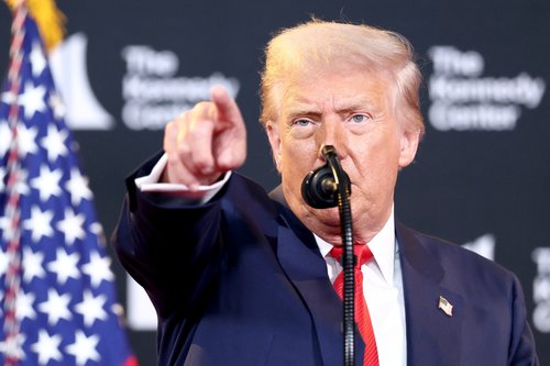 U.S. President Donald Trump takes a question from the press during a visit to the Kennedy Center in Washington, D.C., U.S., August 13, 2025. REUTERS/Kevin Lamarque