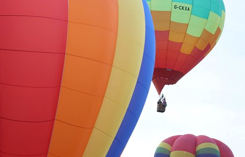 Hot air balloons fly during a mass launch at the annual Bristol International Balloon Fiesta, in Bristol, Britain, August 8, 2025. REUTERS/Toby Melville
