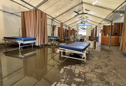 Beds sit in a flooded field hospital after sewage water inundated the emergency department of Nasser Hospital, in Khan Younis, southern Gaza Strip, August 14, 2025.