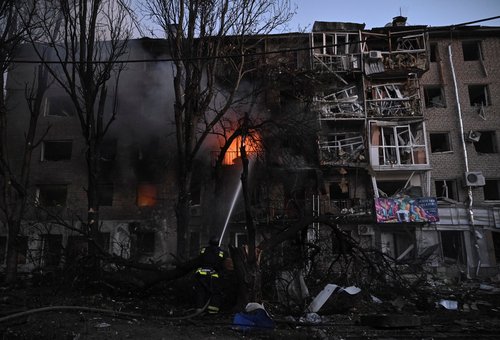 A firefighter works at the site of an apartment building hit during a Russian drone and missile strike, amid Russia's attack on Ukraine, in Zaporizhzhia, Ukraine August 30, 2025. REUTERS/Stringer