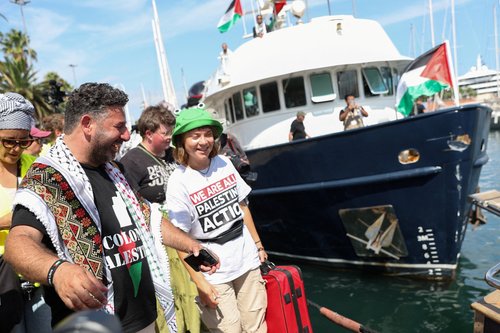 Activists Saif Abukeshek and Greta Thunberg react prior to their departure with other activists on the Global Sumud Flotilla, a humanitarian expedition to Gaza, at the port of Barcelona, Spain August 31, 2025.