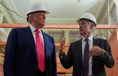 FILE PHOTO: U.S. President Donald Trump and Federal Reserve Chair Jerome Powell speak during a tour of the Federal Reserve Board building