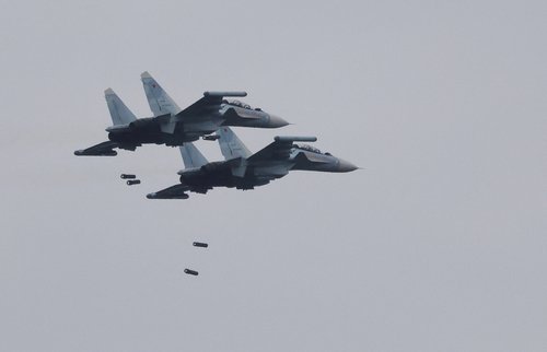 Russian Sukhoi Su-30SM jet fighters fly during the joint Russia-Belarus "Zapad-2025" military drills near Borisov,