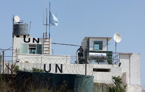U.N. peacekeeper of the United Nations Interim Force in Lebanon (UNIFIL) stands at his post in the village of Markaba, near the border with Israel, southern Lebanon REUTERS/Aziz Taher/File Photo
