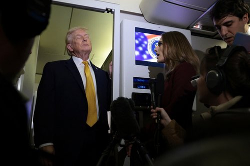 U.S. President Donald Trump pauses before answering a reporter’s question aboard Air Force One en route from Florida to Joint Base Andrews, Maryland, U.S., January 4, 2026. REUTERS/Jonathan Ernst