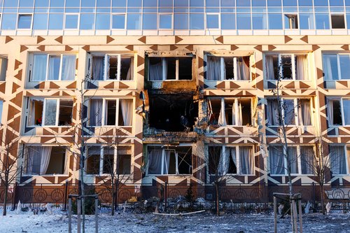 Employees remove debris at the site of a private hospital hit by Russian drone strikes, amid Russia's attack on Ukraine, in Kyiv, Ukraine January 5, 2026. REUTERS/Valentyn Ogirenko