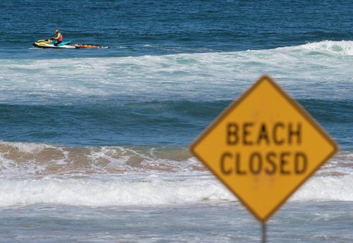 A lifeguard patrols North Steyne beach as beaches are closed after recent shark attacks, in Sydney, Australia, January 20, 2026. REUTERS/Jeremy Piper