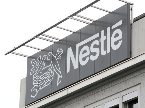 FILE PHOTO: The Nestle logo is seen at one of its plants in Konolfingen, Switzerland, September 28, 2020. REUTERS/Arnd Wiegmann/File Photo