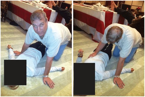 Britain's Prince Andrew kneels over a female in a combination of images released by the Department of Justice in Washington, D.C.