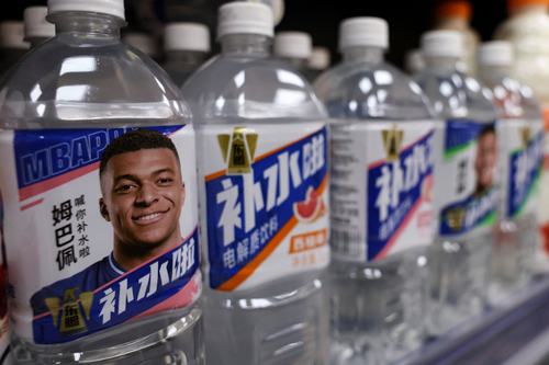 Bottled drinks by Eastroc Beverage with images of French soccer player Kylian Mbappe. REUTERS/Tingshu Wang