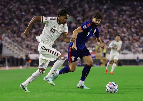 Spain's Lamine Yamal in action with Croatia's Josko Gvardiol REUTERS/Antonio Bronic
