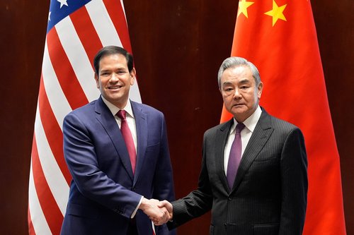 U.S. Secretary of State Marco Rubio shakes hands with China’s Foreign Minister Wang Yi in Munich, Germany,