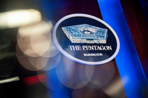 FILE PHOTO: The Pentagon logo is seen behind the podium in the briefing room at the Pentagon in Arlington, Virginia, U.S., January 8, 2020.