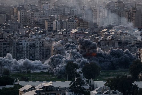 Smoke rises after an Israeli strike on Beirut's southern suburbs, following an escalation between Hezbollah and Israel amid the U.S.-Israeli conflict with Iran