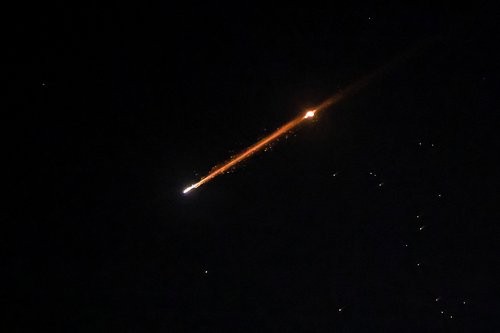 An Iranian missile with cluster munitions flies over the city, amid the U.S.-Israeli conflict with Iran, in Jerusalem, March 20, 2026. REUTERS/Ronen Zvulun TPX IMAGES OF THE DAY