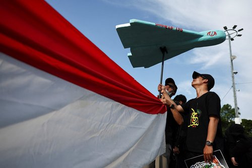 Protesters hold a mockup of Iranian-made drone Shahed-136, during a rally marking al-Quds Day (Jerusalem Day), amid the U.S.-Israeli conflict with Iran, outside the U.S. Embassy in Jakarta, Indonesia, March 13, 2026.