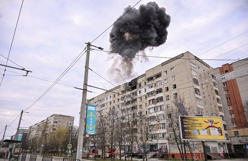Smoke rises as a Russian drone hits an apartment building. REUTERS/Stringer TPX IMAGES OF THE DAY