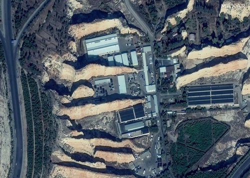 A satellite image shows President Bashar al-Assad garages', in Damascus