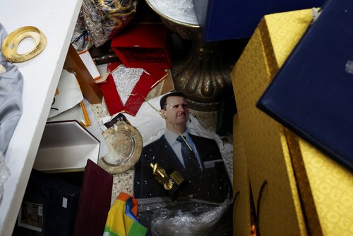 A view of personal souvenirs for Syria's Bashar al-Assad at one of the rooms at Presidential Palace known as Qasr al-Shaab
