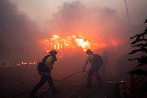 Palisades Fire burns during a windstorm on the west side of Los Angeles