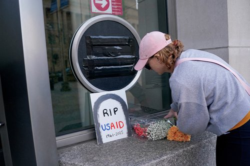 FILE PHOTO: USAID signage is covered at the agency's headquarters in Washington