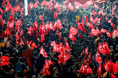 Supporters of Istanbul Mayor Ekrem Imamoglu gather outside the Istanbul Metropolitan Municipality building to protest the detention of Imamoglu, in Istanbul
