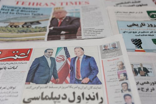 FILE PHOTO: An Iranian newspaper with a cover photo of Iran's Foreign Minister Abbas Araqchi and U.S. Middle East envoy Steve Witkoff, is seen in Tehran