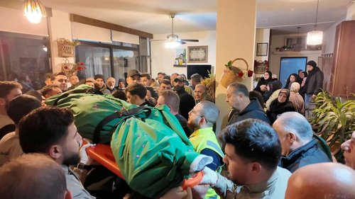 Mourners carry the body of journalist Amal Khalil, who was killed in an Israeli strike on Wednesday, in Baisariyeh, Lebanon April 23, 2026, in this still image taken from a video. REUTERS TV/REUTERS TPX IMAGES OF THE DAY