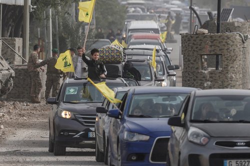 Displaced people make their way back to their homes after crossing the bridge linking southern Lebanon to the rest of the country, following the ceasefire between Lebanon and Israel in Qasmiyeh, Lebanon, April 18, 2026.