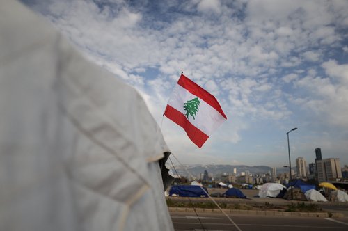 A Lebanese flag on a tent of displaced people, at a makeshift encampment, amid a temporary ceasefire between Lebanon and Israel, in Beirut, Lebanon, April 25, 2026.