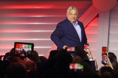 FILE PHOTO: Hungarian Prime Minister Viktor Orban arrives to address supporters after the announcement of the partial results of parliamentary election in Budapest, Hungary, April 12, 2026. REUTERS/Bernadett Szabo/File Photo