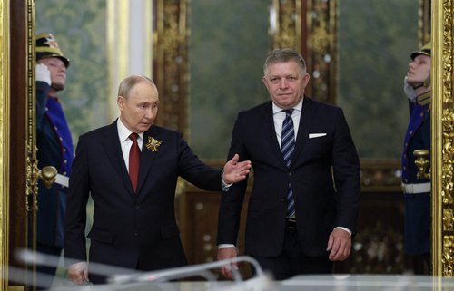 Russian President Vladimir Putin shows the way to Slovak Prime Minister Robert Fico during a meeting in Moscow, Russia May 9, 2026. REUTERS/Ramil Sitdikov/Pool TPX IMAGES OF THE DAY