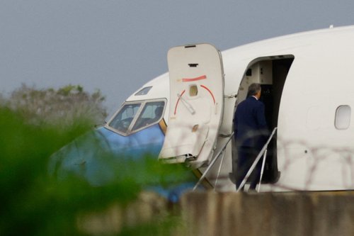 CIA Director John Ratcliffe boards a U.S. government plane after a delegation met with his counterpart at Cuba's Interior Ministry in Havana on Thursday, at Jose Marti International Airport