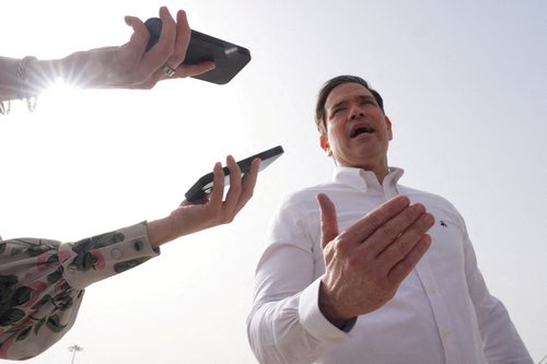 United States Secretary of State Marco Rubio speaks to the journalists before boarding his plane at Indira Gandhi International Airport in New Delhi, India, Monday, May 25, 2026.