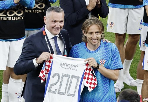 Croatia's Luka Modric, President of the Croatian Football Federation Marijan Kustic REUTERS/Thomas Mukoya