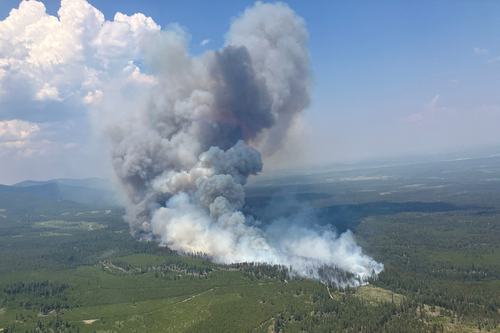 Smoke rises from the Fiftynine Creek wildfire. BC Wildfire/Handout via REUTERS.