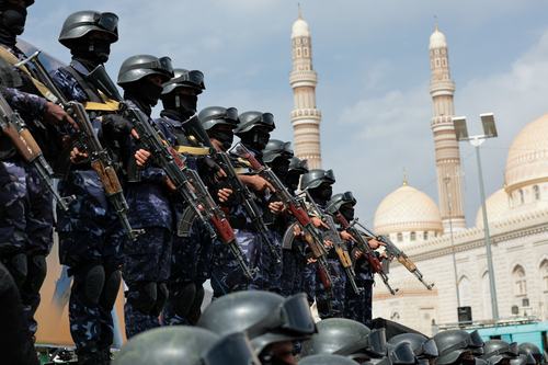 Members of Houthi security force stand guard as Houthi supporters rally against the Saudi-led coalition's restrictions on Houthi-controlled areas, which the group describes as a blockade, in Sanaa, Yemen, July 17, 2026. REUTERS/Khaled Abdullah